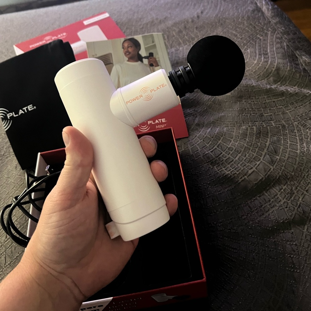 Power Plate mini portable massage gun.  Brand new - never used in box!
